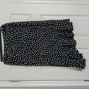 Liquid knit skirt with asymmetrical ruffle hem
